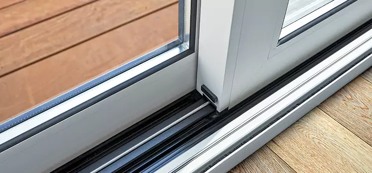 Why Your Sliding Door Keeps Getting Stuck in Dedham, MA?